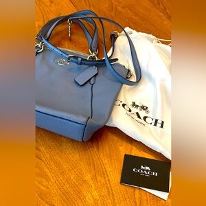 Coach Bag with strap and bag. Used a handful of times.